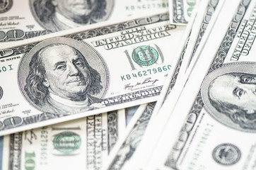 One hundred dollars  as background.