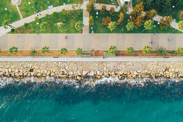 Limassol. Cyprus. Aerial top view of Limassol Molos Park, alley with palms for walking. Mediterranean sea coastline.