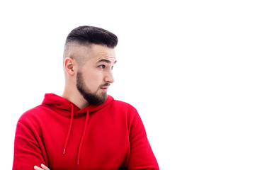 Fototapeta premium Handsome man in red casual clothes posing on white background