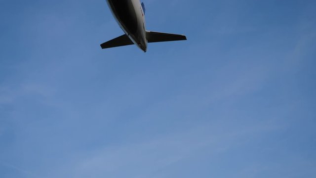 Landing approach of an airplane on runway Northwest at Frankfurt International airport