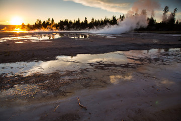 Yellowstone hotsprirngs with reflection at sunset