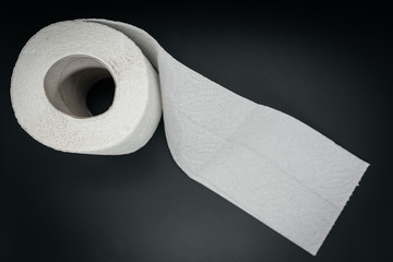 Toilet paper close up on dark background