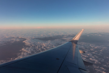 Fototapeta na wymiar plane traveling to chile at the sunset