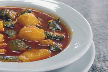 National Spanish cuisine of Valencia. Unique delicious Allipebre dish. Freshwater eel from Lake Albufera stewed with potatoes. Travel to Valencia.