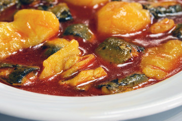 National Spanish cuisine of Valencia. Unique delicious Allipebre dish. Freshwater eel from Lake Albufera stewed with potatoes. Travel to Valencia.