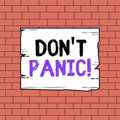 Obraz premium Text sign showing Don T Panic. Business photo text suddenly feel so worried or frightened that you can not behave Wooden square plank empty frame slots grooves wood panel colored board lumber