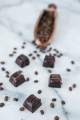Dark Chocolate Truffles on Marble Background