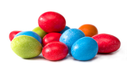 colored candies on a white background