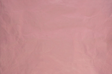  crumpled leather background in dark pink