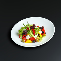 Dishes of traditional Russian cuisine. Restaurant serving. Black background.