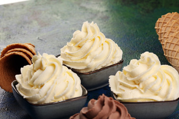 Vanilla soft served ice cream tasty sundae dairy ice cream on rustic background