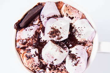 Cup of hot chocolate with marshmallows on a white background
