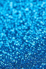 Festive background with blue sparkles. Party time.