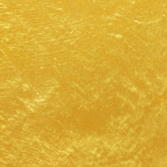 gold paint on concrete wall texture