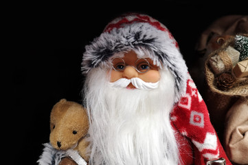 Beautiful Santa Claus as toy close-up