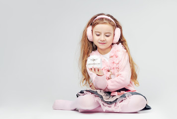 Girl in pink posing in front of the camera close-up