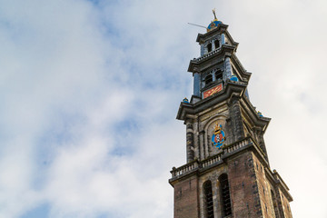 Fototapeta na wymiar Bell tower of the biggest church in Amsterdam, The Western Church