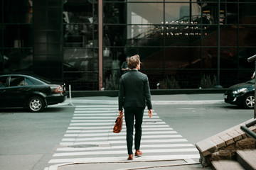 The Businessman Crossing The Road