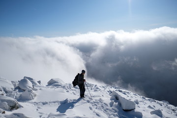 climber on top of mountain
