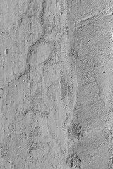 Abstract concrete texture gray background. Chips, cracks, pores in concrete