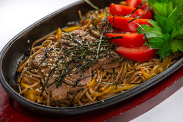  It is hot noodles with meat and vegetables
