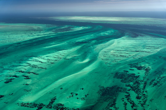 Coral reef in the ocean. The aerial shot was taken in Australia from a Cessna plane