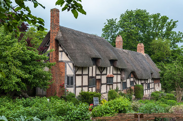 STRATFORD UPON AVON, ENGLAND - MAY 27, 2018: Anne Hathaway's (William Shakespeare's wife) famous thatched cottage and garden at Shottery, just outside Stratford upon Avon, England
