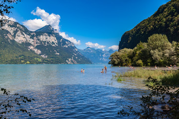 Stunning view on the lake side of Walensee in Switzerland on a sunny summer day