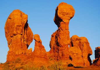 The unusual, colorful and beautiful sandstone sculptures of Arches National Park at sunset.