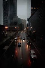 traffic in the city on rainy night