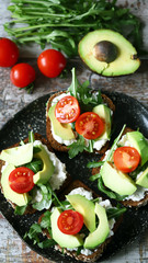 Selective focus. Avocado toasts on a plate. Healthy food. Vegan diet. Keto diet.
