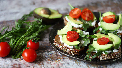 Selective focus. Avocado toasts on a plate. Healthy food. Vegan diet. Keto diet.