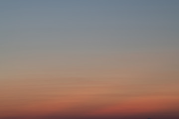 Gradient bright orange sky and the light of the sun
