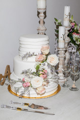 Obraz na płótnie Canvas Tasty wedding cake, decorated with flowers.