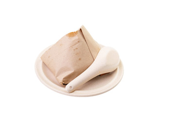 Malay traditional cuisine called Nasi Lemak wrapped in a wrapping paper. .