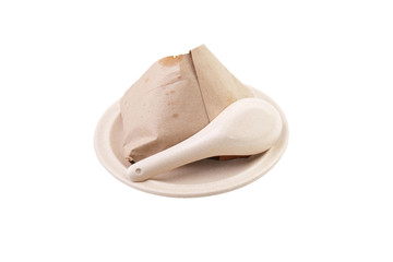 Malay traditional cuisine called Nasi Lemak wrapped in a wrapping paper. .