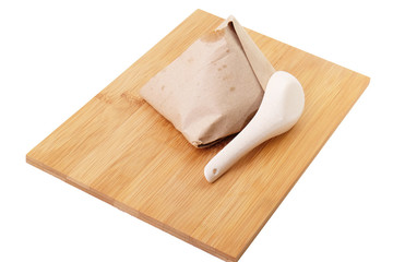 Malay traditional cuisine called Nasi Lemak wrapped in a wrapping paper. .