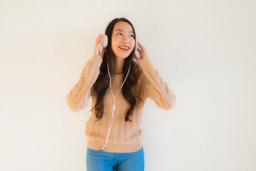 Portrait beautiful young asian women happy enjoy with listen music