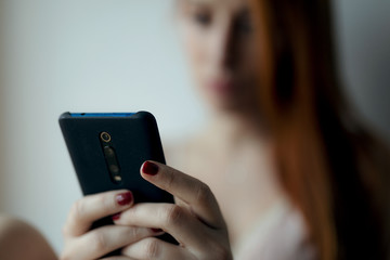 young woman using mobile phone