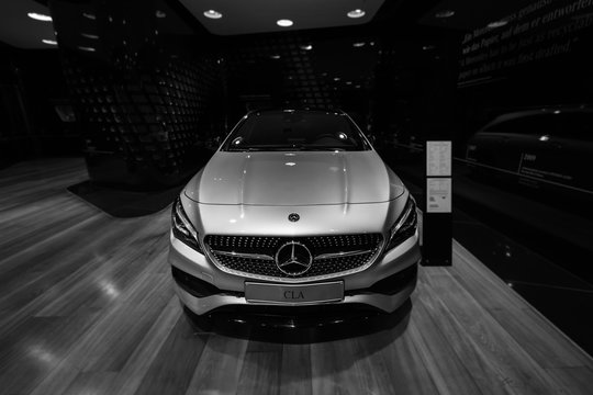 BERLIN - DECEMBER 21, 2017: Showroom. Subcompact executive car Mercedes-Benz CLA-Class CLA 220d Peak Edition. Black and white. Since 2014.