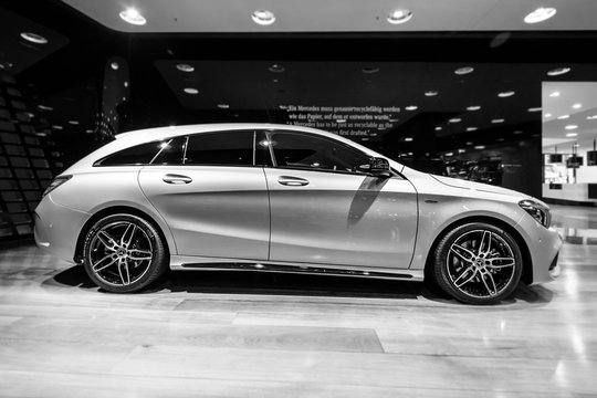 BERLIN - DECEMBER 21, 2017: Showroom. Subcompact executive car Mercedes-Benz CLA-Class CLA 220d Peak Edition. Black and white. Since 2014.
