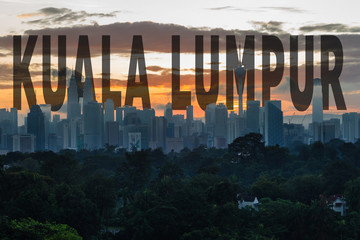 malaysia skyscraper during sunrise with wording