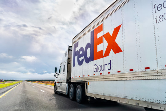 Dec 8, 2019 Los Angeles County / CA / USA - FedEx Ground truck driving on the interstate