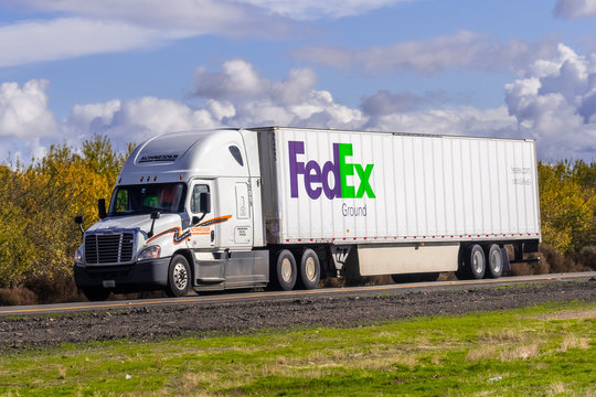 Dec 8, 2019 Los Angeles County / CA / USA - FedEx Ground truck driving on the interstate