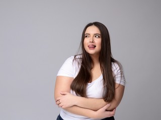 Fototapeta premium Smiling Plus Size attractive Woman dreaming.