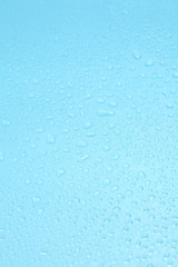 Close up water drops on blue background, Water drop in macro photography