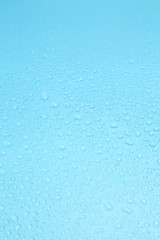 Close up water drops on blue background, Water drop in macro photography