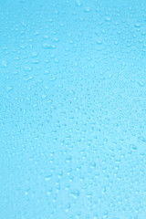 Close up water drops on blue background, Water drop in macro photography