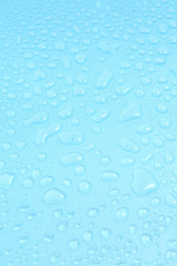 Close up water drops on blue background, Water drop in macro photography