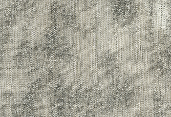 Macro photo texture of synthetic shiny silver fabric, closeup of a thread, shiny thread.